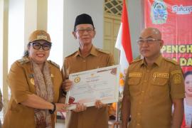 KALURAHAN PUTAT RAIH JUARA 1 LOMBA ADMINISTRASI KEPENDUDUKAN TIGKAT KABUPATEN